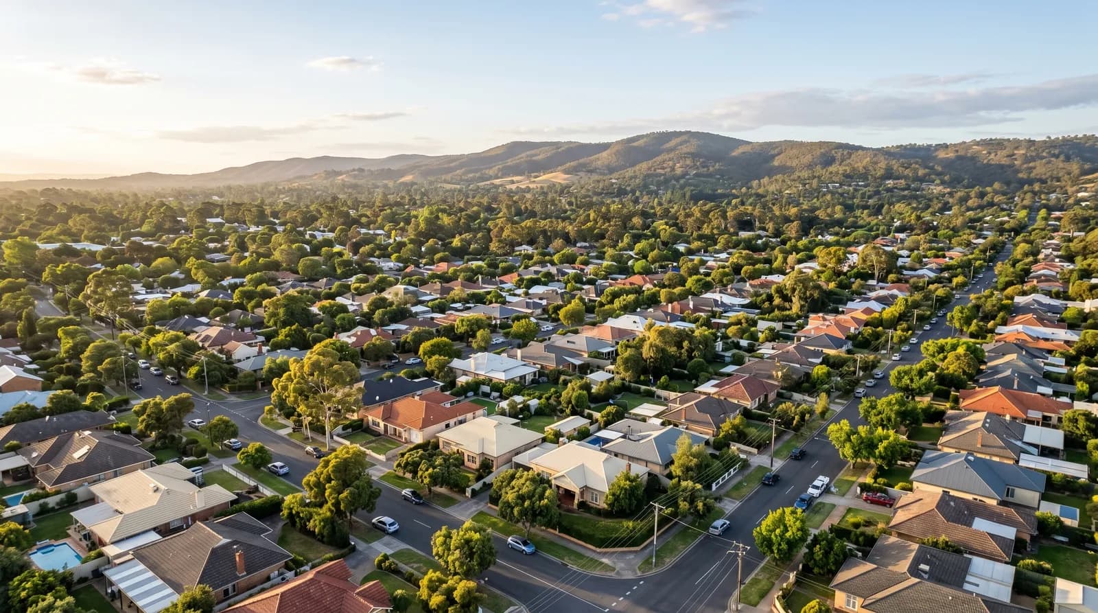 Aerial view of an established north-east Adelaide family suburb with the foothills beyond